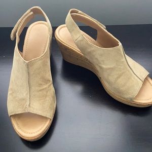 Women’s size 8 1/2 tan suede shoes.